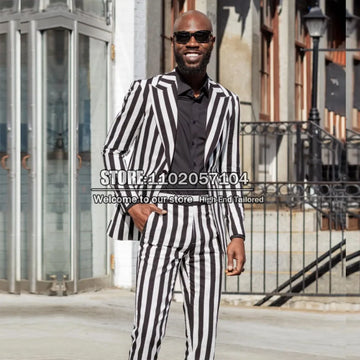 Trajes de hombres hechos a medida Jaqueta de rayas blanca/negra del ajuste delgado+pantalones 2 piezas de verano novio de la playa ropa blazer fumador de negocios esmoquin