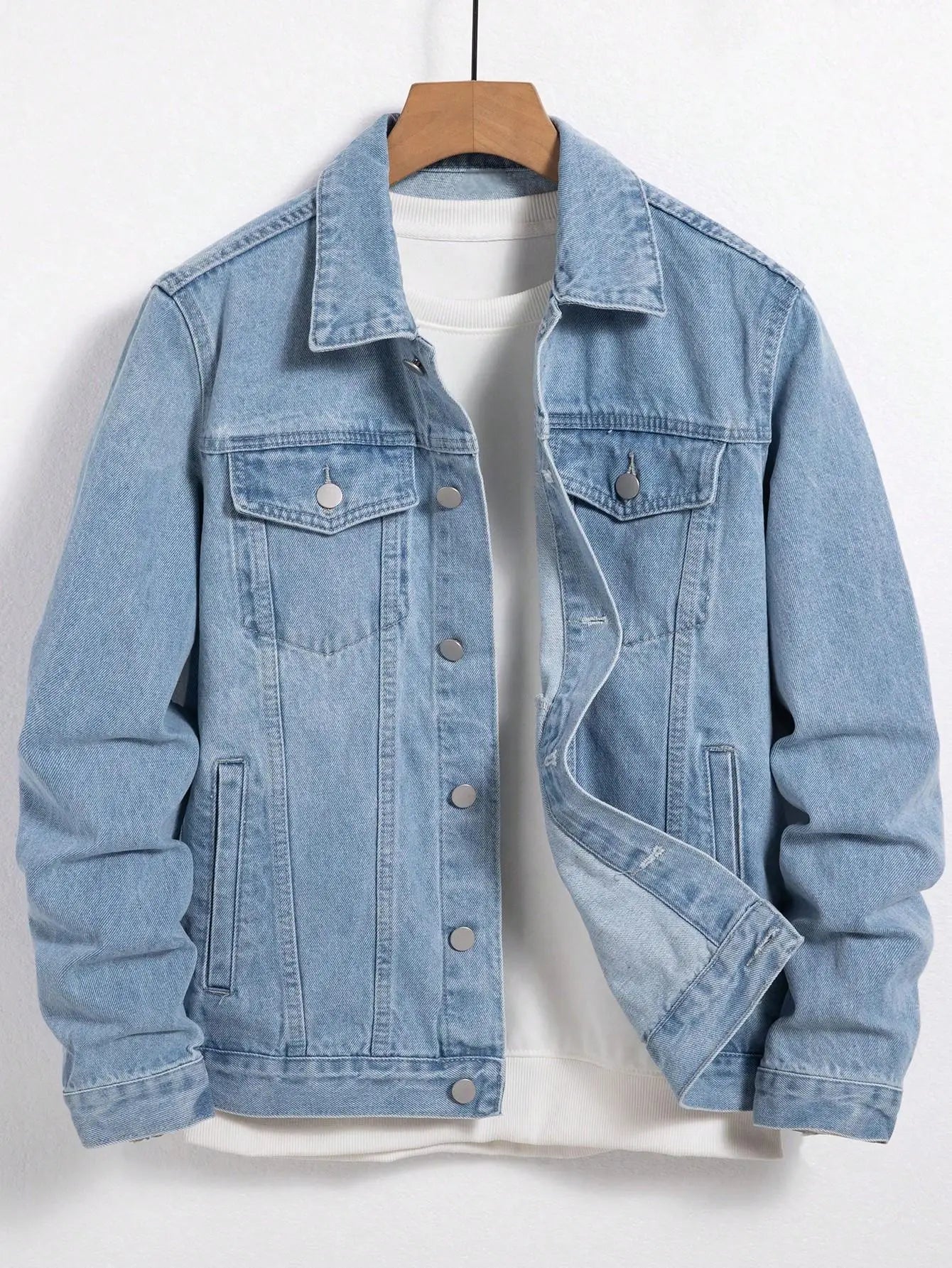 Men's denim jacket for spring and autumn. Blue denim coat. Daily casual wear. Fashion trend.
